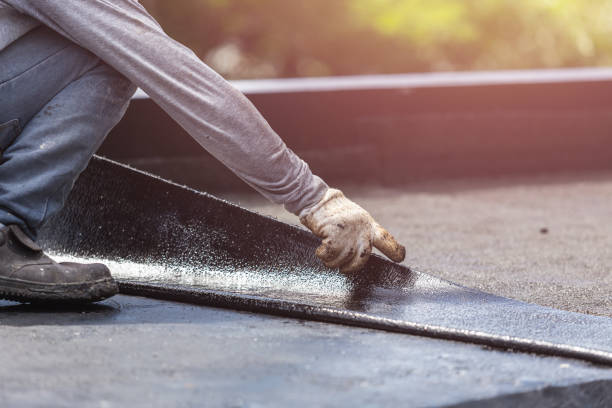 Professional Basement Waterproofing technician working in Hillsboro, IN